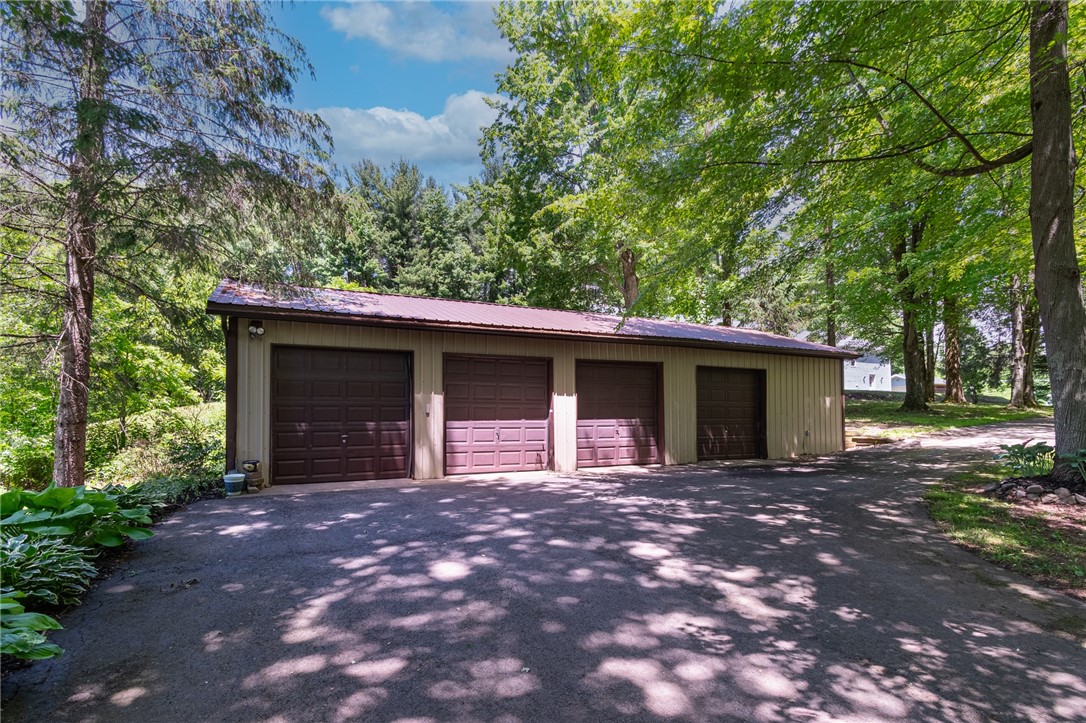 7733 East Port Bay Road Wolcott, NY 14590 - Photo 6 of 49 The FOUR BAY garage - lots of space for your toys!
