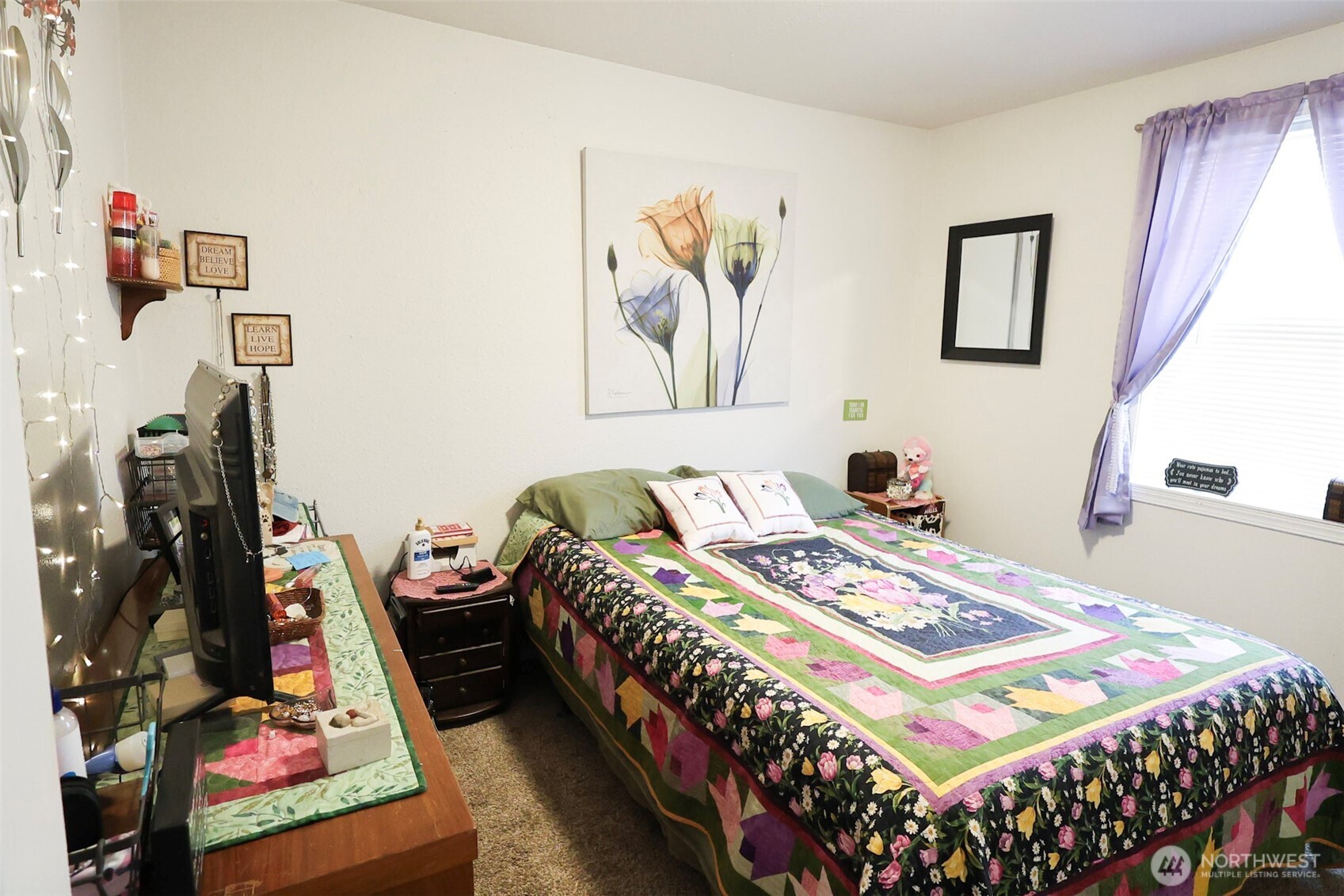 136 First Street Sumas, WA 98295 - Photo 11 of 20 a bedroom with bed and a flat tv screen