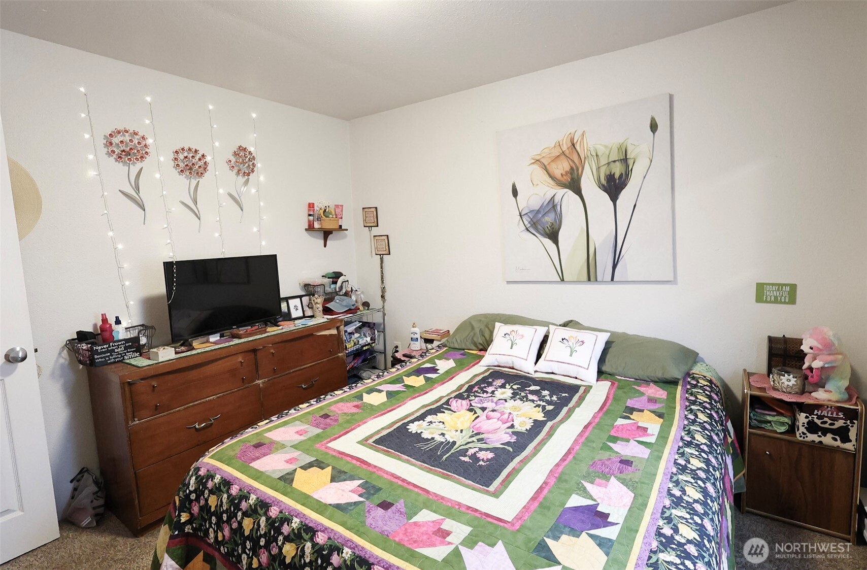 136 First Street Sumas, WA 98295 - Photo 12 of 20 a bedroom with a bed and a couch