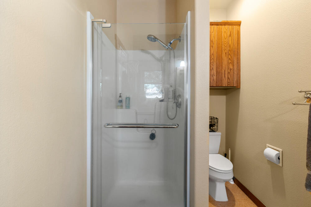11750 Merganser Road Klamath Falls, OR 97601 - Photo 35 of 66 a bathroom with a toilet and a shower