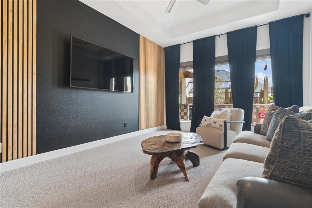 582 Broadleaf Way Haslet, TX 76052 - Photo 14 of 38 a living room with furniture and a flat screen tv