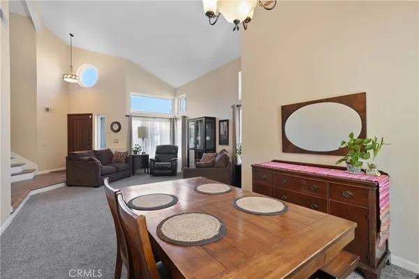 a kitchen with stainless steel appliances a refrigerator sink and microwave