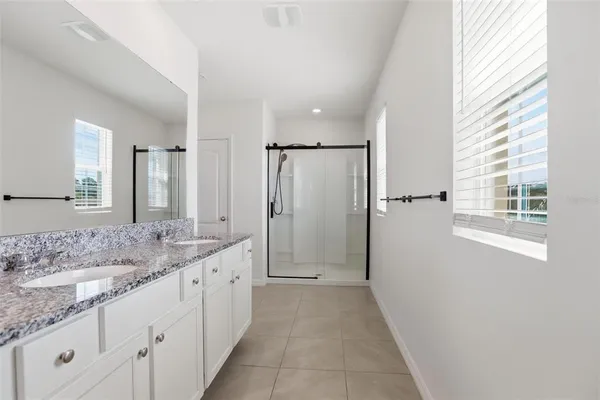 an empty room with a bathroom