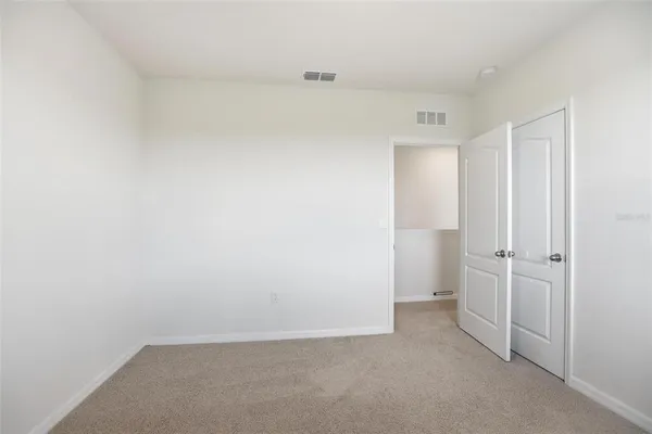 a view of a room with an empty space