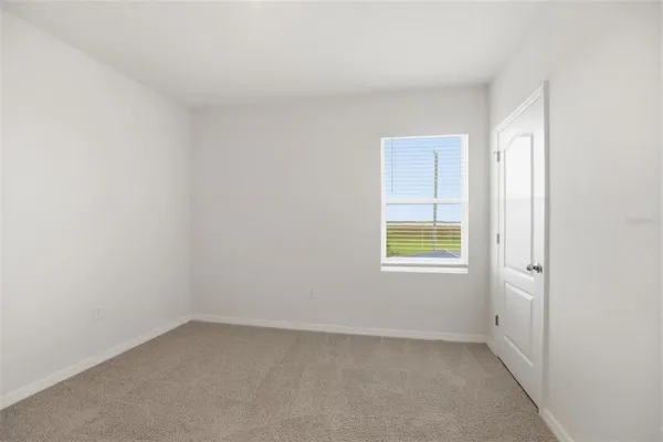 a utility room with sink dryer and washer