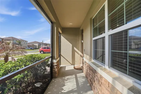 a backyard of a house with lots of green space