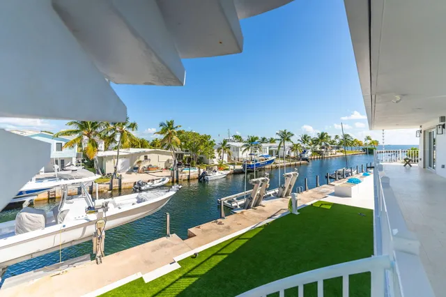 a view of a lake with boats