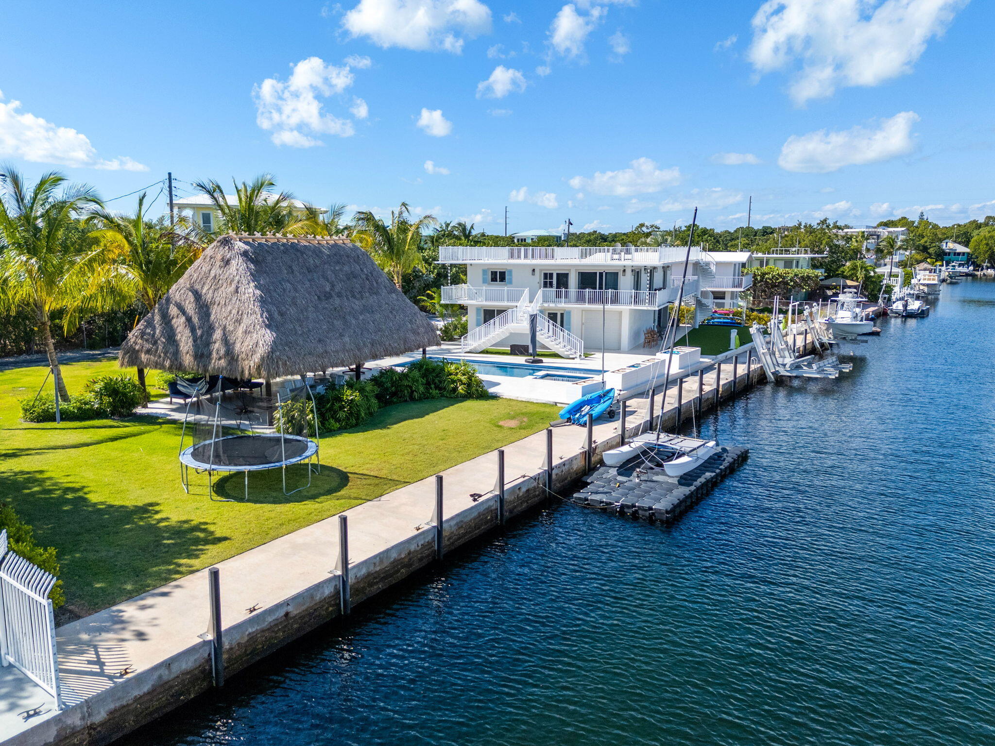 17 Poisonwood Road Key Largo, FL 33037 - Photo 54 of 57 an aerial view of a house with swimming pool garden and patio