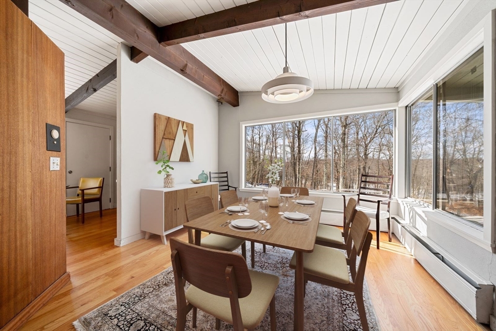 15 Westview Drive Sutton, MA 01590 - Photo 11 of 39 a view of a dining room with furniture window and outside view