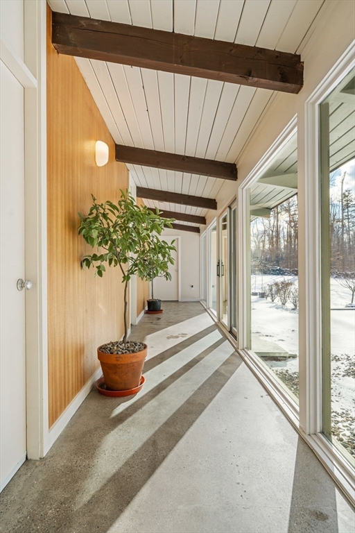 15 Westview Drive Sutton, MA 01590 - Photo 17 of 39 a living room filled with furniture and a potted plant
