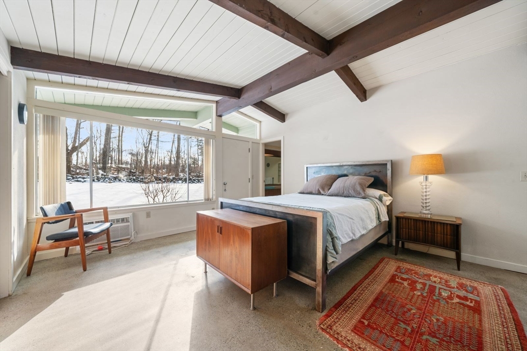 15 Westview Drive Sutton, MA 01590 - Photo 19 of 39 a bed sitting in a spacious bedroom next to a window