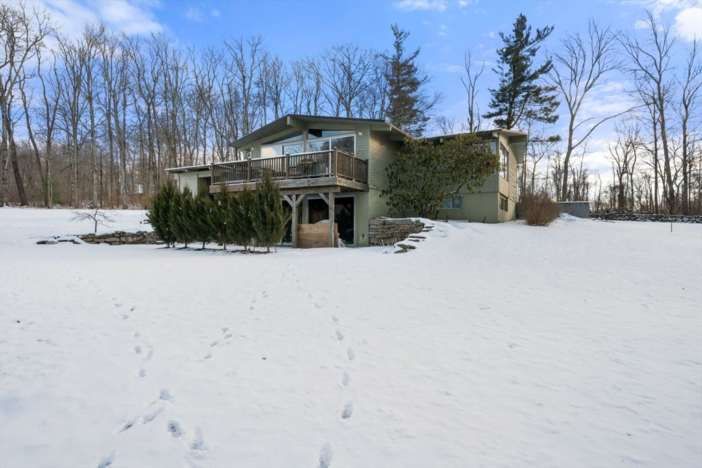 15 Westview Drive Sutton, MA 01590 - Photo 2 of 39 a view of a house with snow on the road