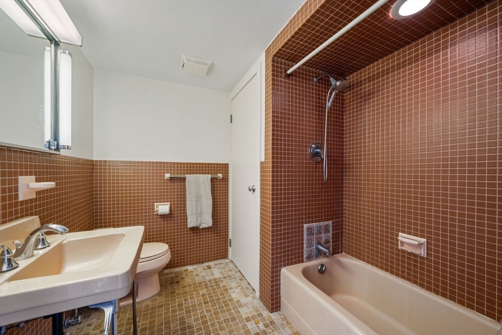 15 Westview Drive Sutton, MA 01590 - Photo 25 of 39 a bathroom with a sink toilet and shower
