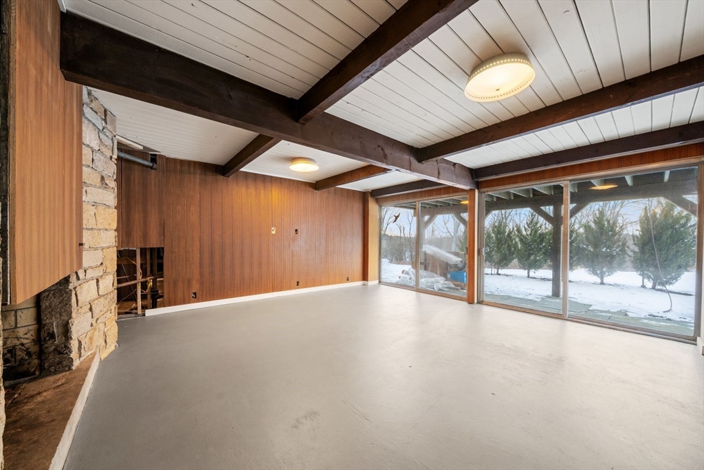 15 Westview Drive Sutton, MA 01590 - Photo 30 of 39 a view of an empty room with a fireplace
