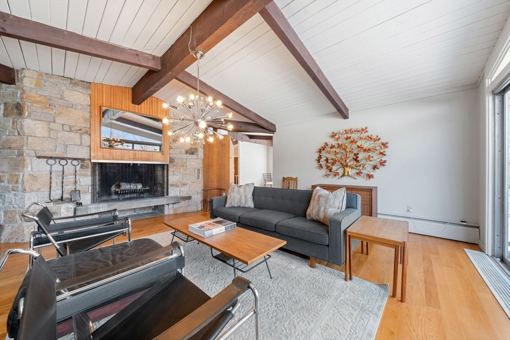 15 Westview Drive Sutton, MA 01590 - Photo 9 of 39 a living room with furniture and a fireplace