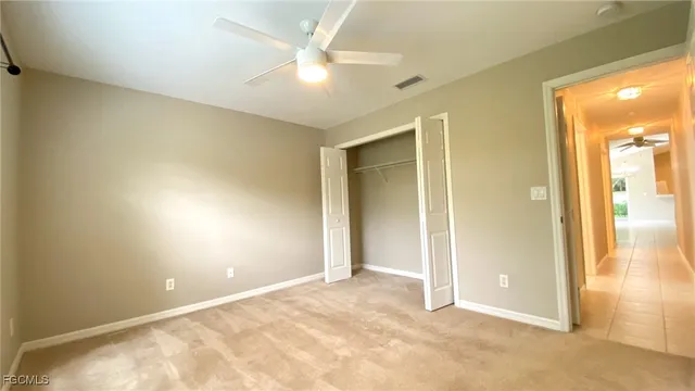an empty room with a bathroom