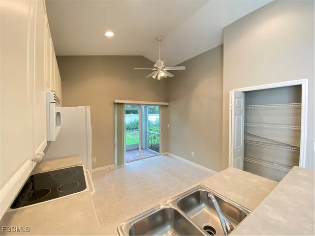 a bedroom with a bed and a cabinets