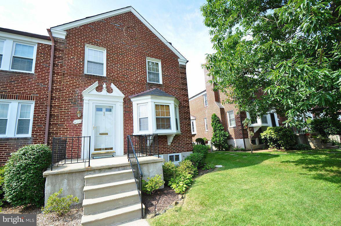 408 Greenlow Road Baltimore, MD 21228 - Photo 1 of 20 a front view of a house with a yard