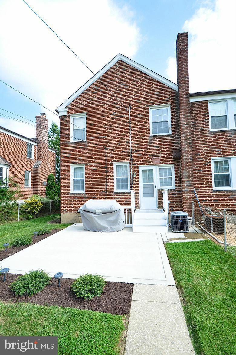 408 Greenlow Road Baltimore, MD 21228 - Photo 2 of 20 a front view of a house with a yard