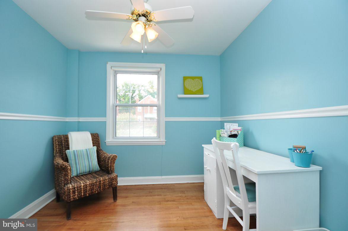 408 Greenlow Road Baltimore, MD 21228 - Photo 13 of 20 a living room with furniture and a window