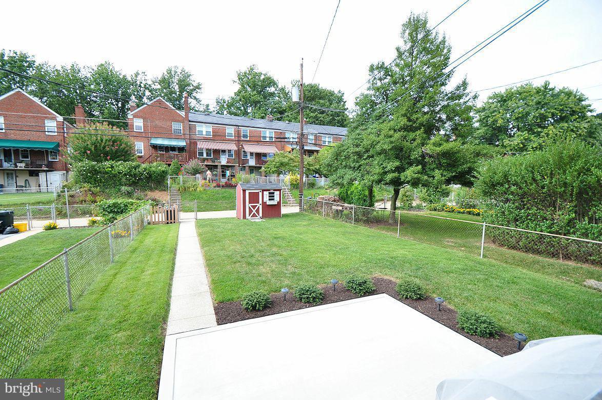 408 Greenlow Road Baltimore, MD 21228 - Photo 4 of 20 a view of a house with a backyard