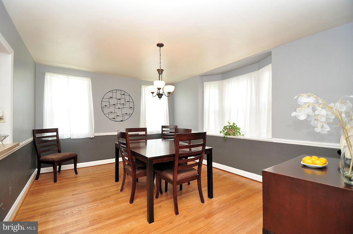 408 Greenlow Road Baltimore, MD 21228 - Photo 8 of 20 a view of a dining room with furniture and window