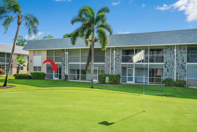 a view of a building with a street