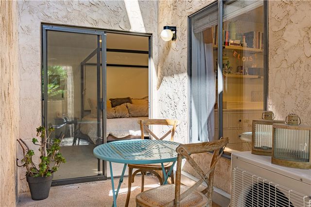 a view of a balcony dining area