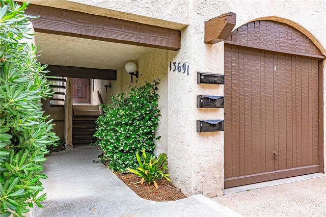 a potted plants in front of a door