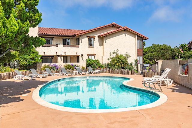 a view of a house with a swimming pool