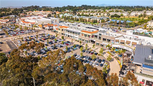an aerial view of residential building with parking space
