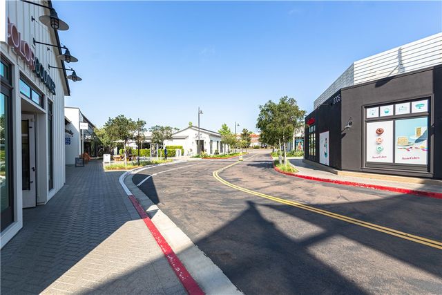 a view of swimming pool with outdoor seating