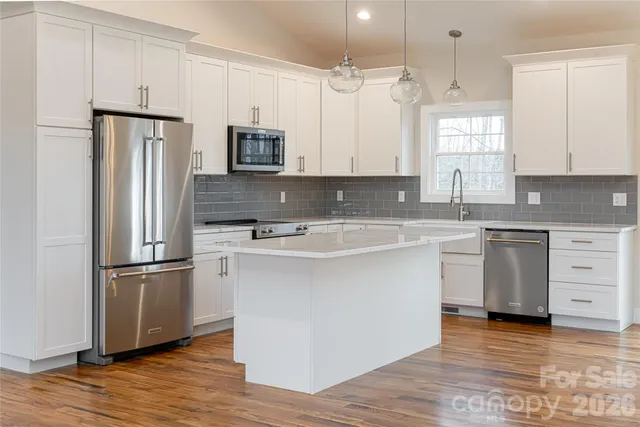 a white bath tub sitting next to a window