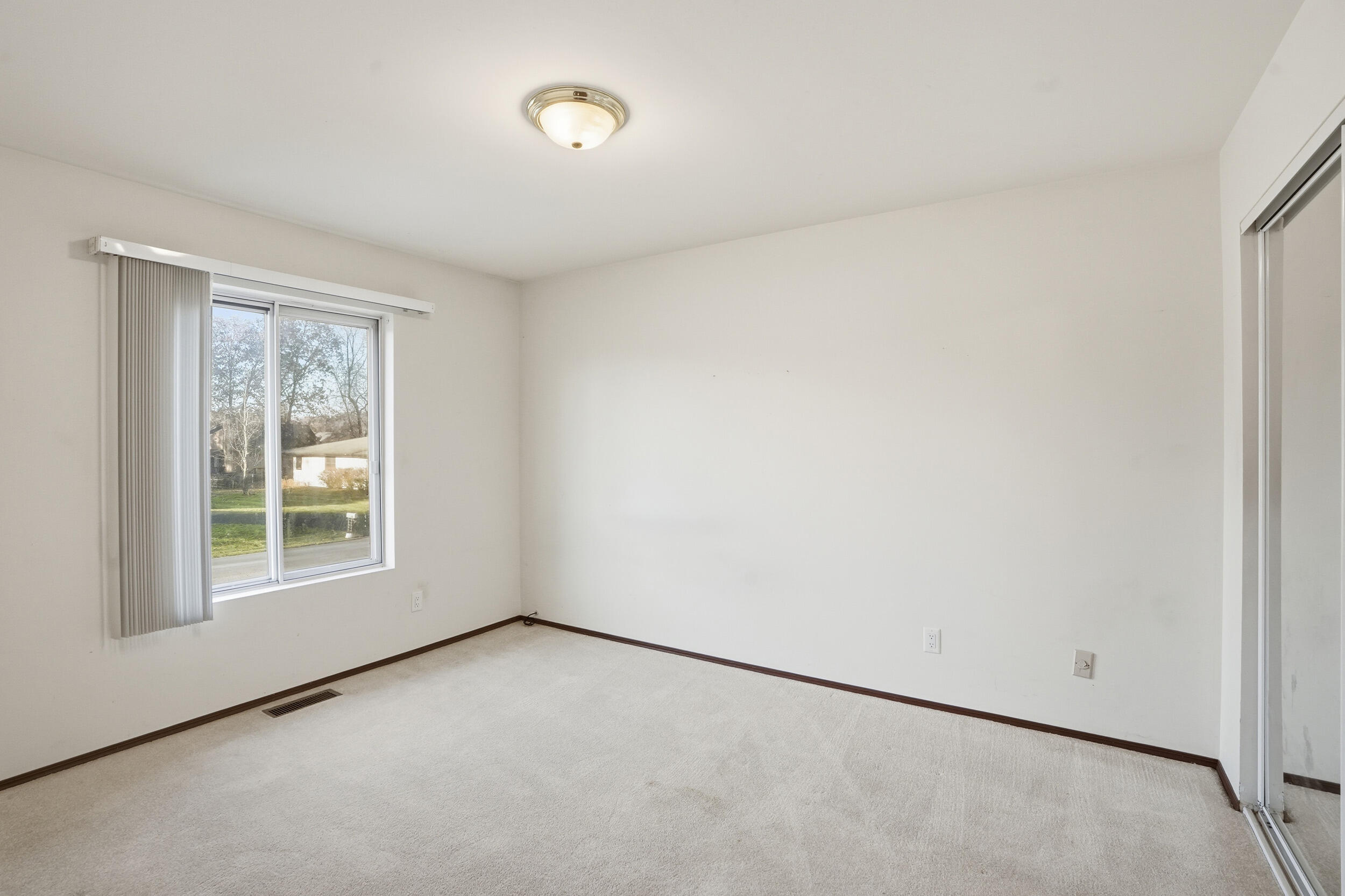 4142 Augusta Drive Crown Point, IN 46307 - Photo 13 of 24 an empty room with a window