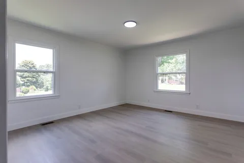 an empty room with a window
