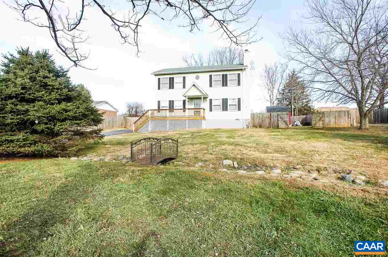 1074 Cedar Grove Road Ruckersville, VA 22968 - Photo 1 of 23 a view of a house with a yard and sitting area