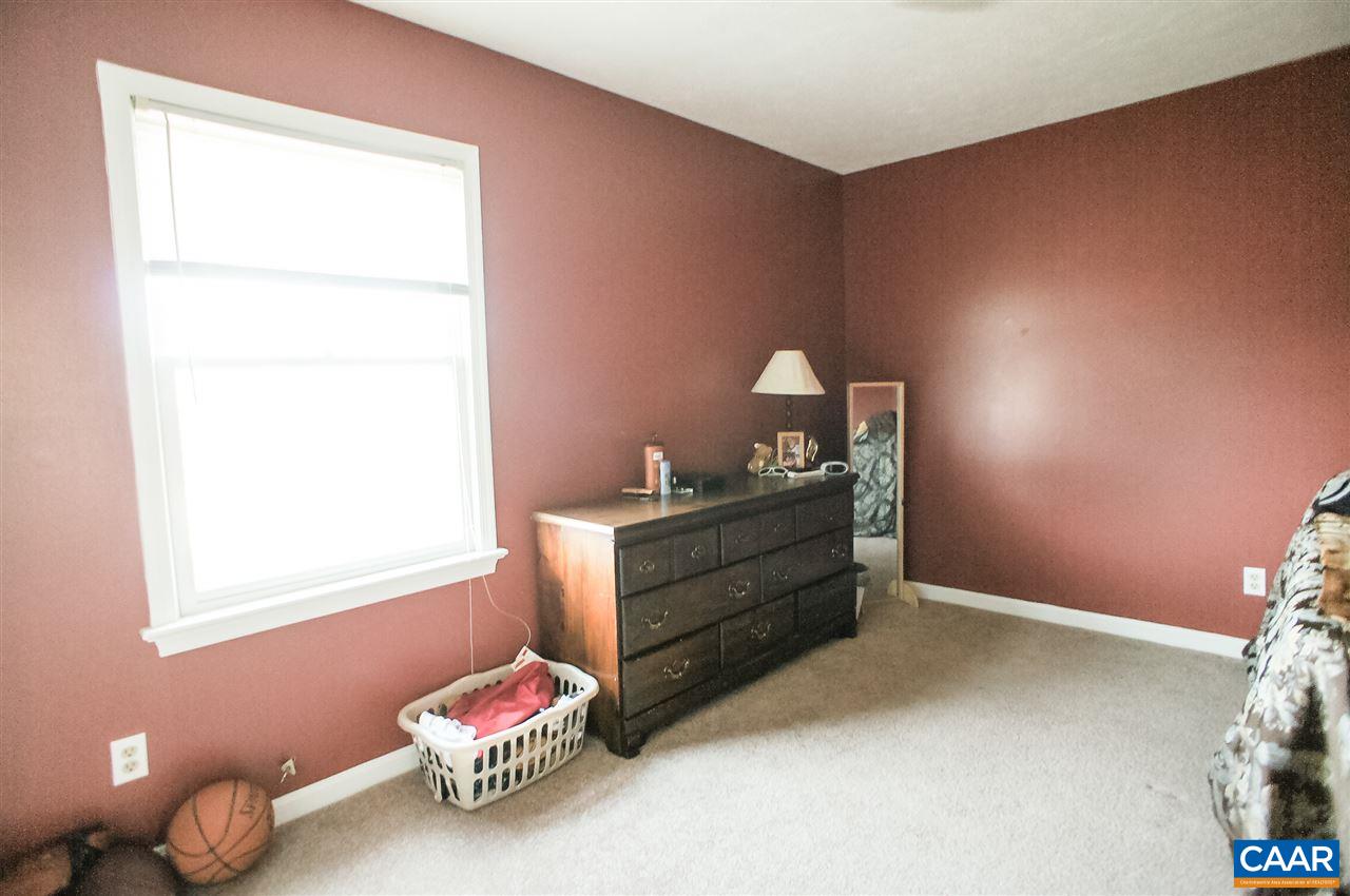 1074 Cedar Grove Road Ruckersville, VA 22968 - Photo 13 of 23 a bedroom with a bed and a window