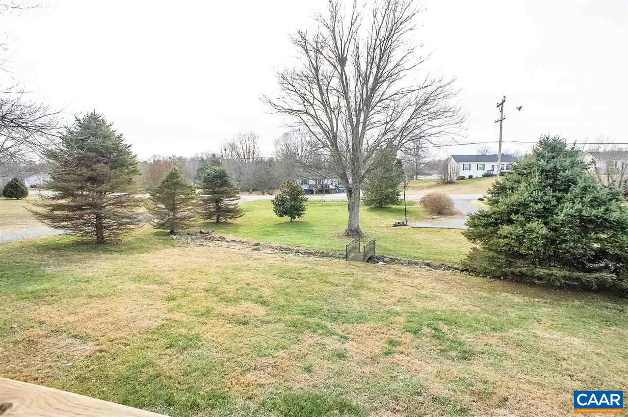 1074 Cedar Grove Road Ruckersville, VA 22968 - Photo 17 of 23 a view of a yard with an trees