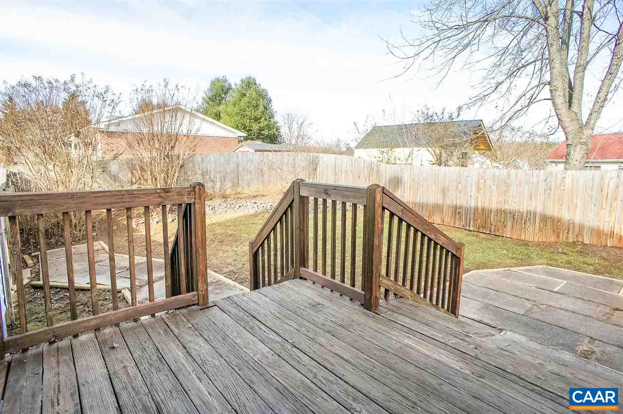 1074 Cedar Grove Road Ruckersville, VA 22968 - Photo 21 of 23 a view of a wooden deck with a yard