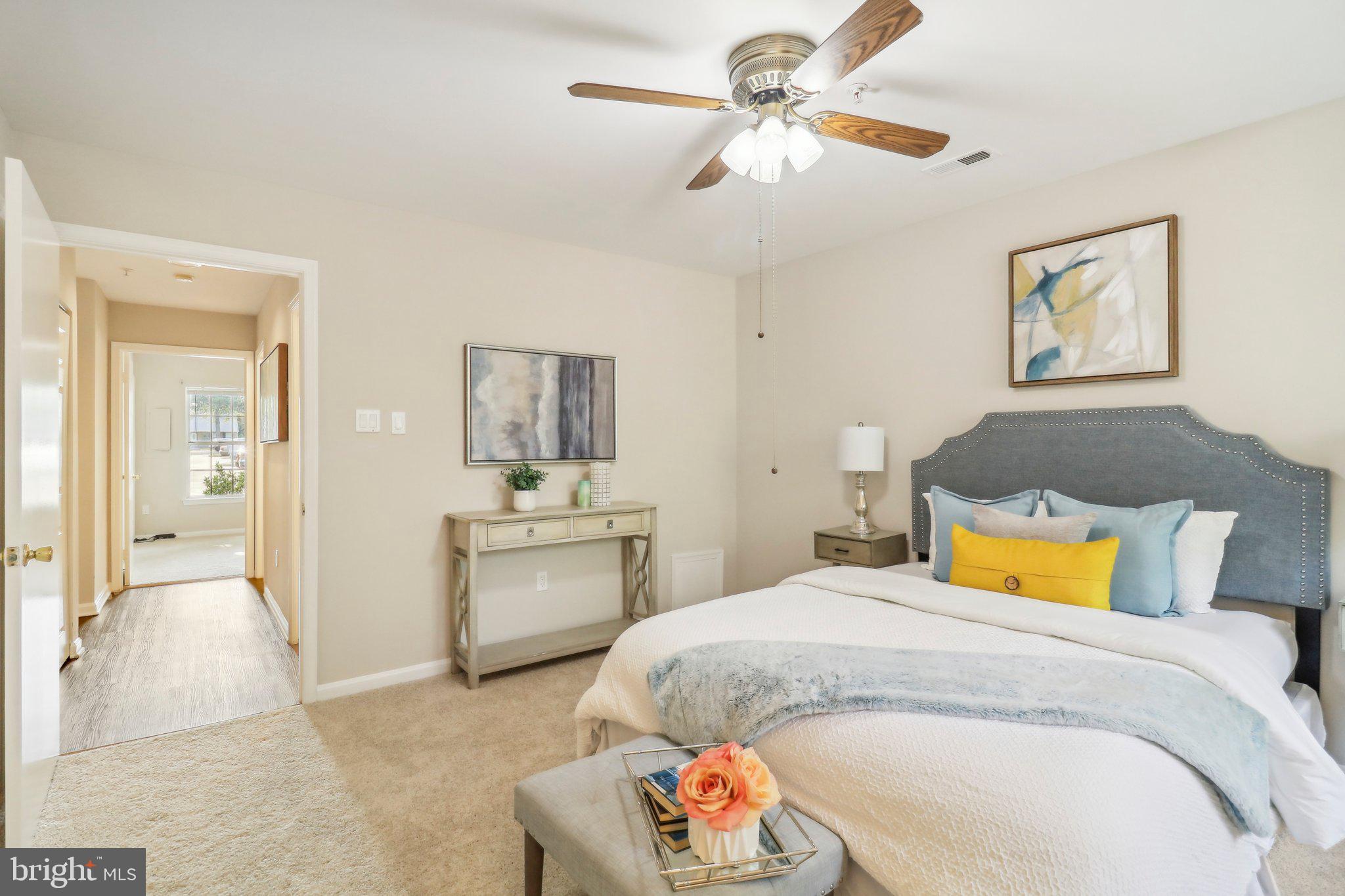 9264 Cherry Lane, Unit 5 Laurel, MD 20708 - Photo 15 of 35 Primary bedroom with ceiling fan
