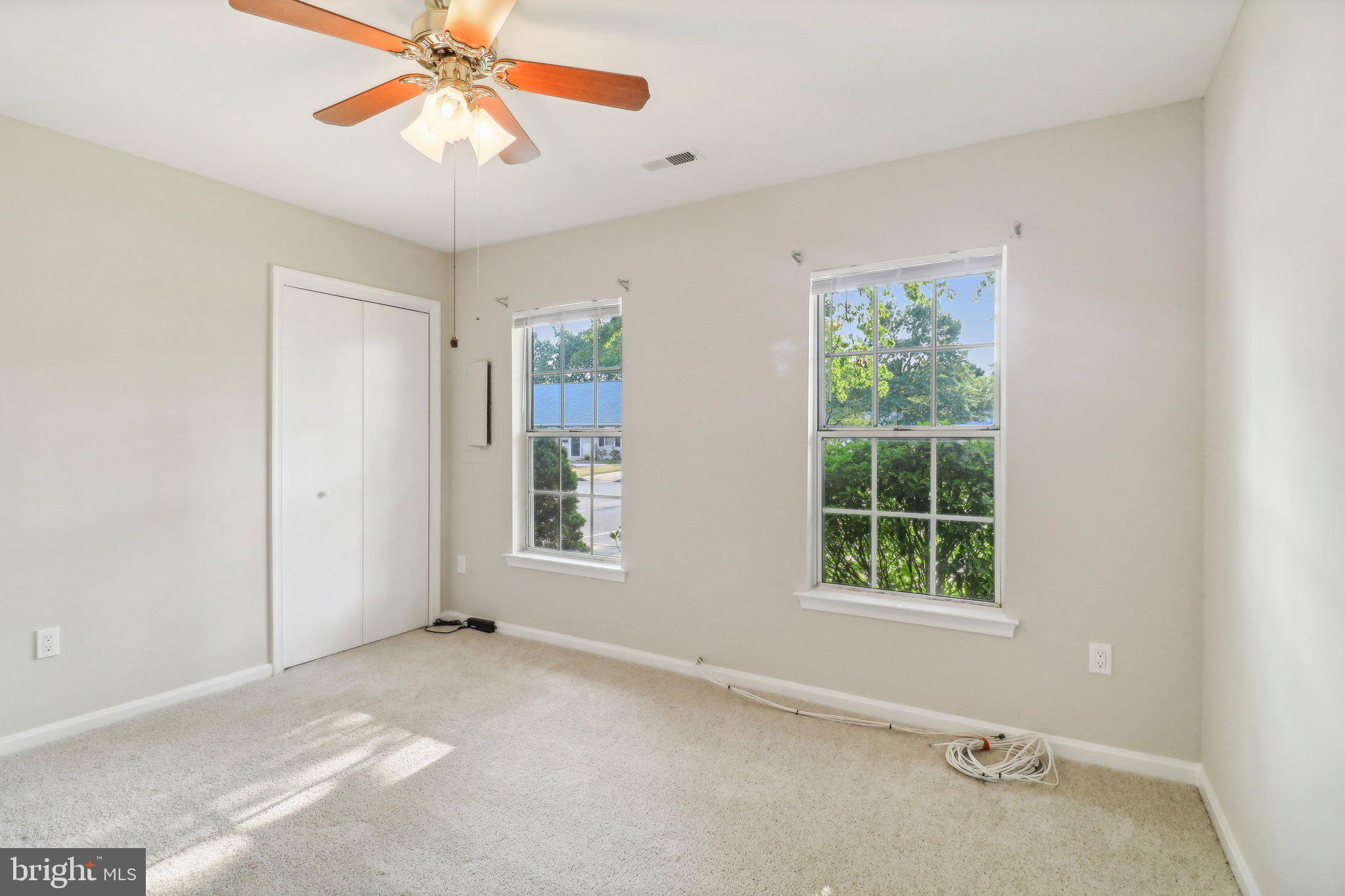 9264 Cherry Lane, Unit 5 Laurel, MD 20708 - Photo 22 of 35 Ceiling fan and deep closet