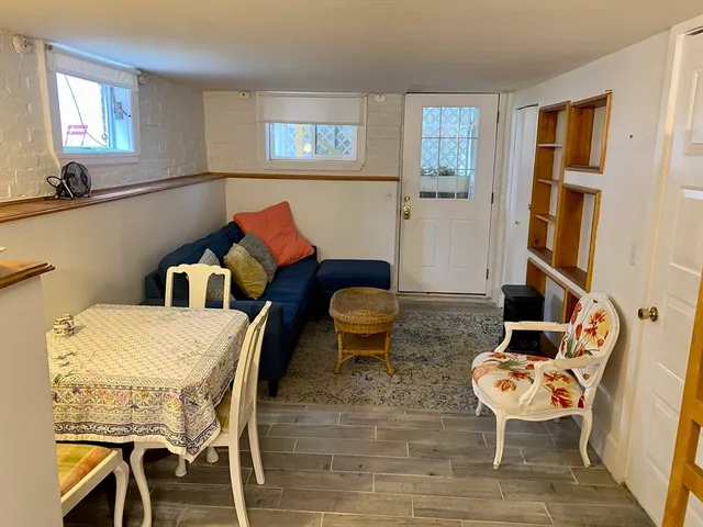 a living room with furniture and a table