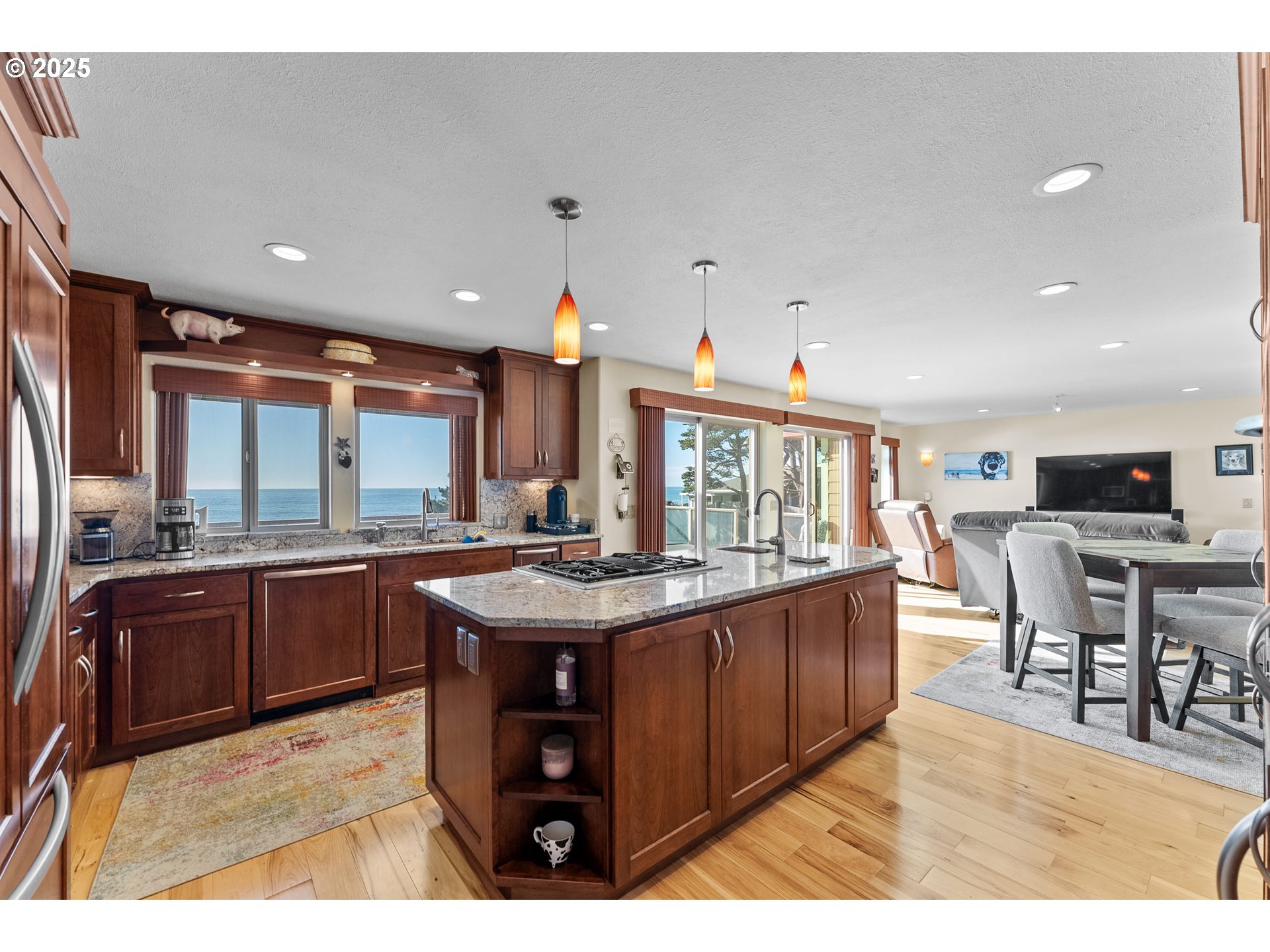 98686 Fox Drive Brookings, OR 97415 - Photo 18 of 48 a kitchen with stainless steel appliances granite countertop a stove and a refrigerator
