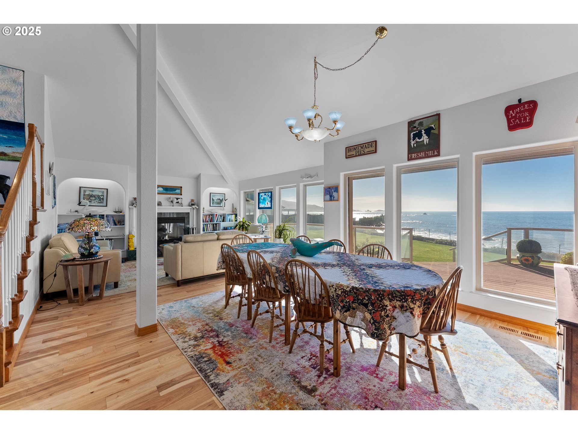 98686 Fox Drive Brookings, OR 97415 - Photo 26 of 48 a view of a dining room with furniture window and wooden floor