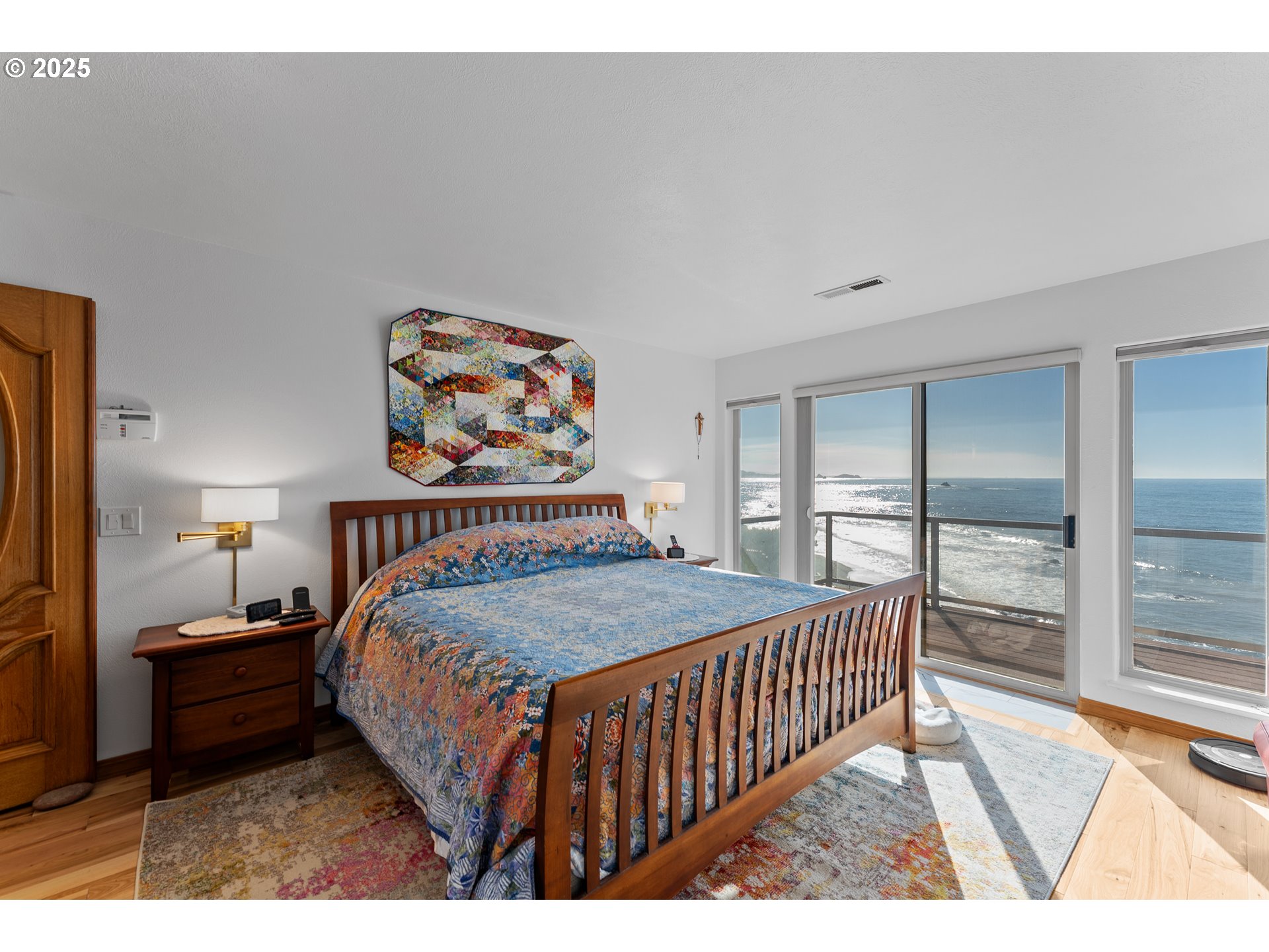 98686 Fox Drive Brookings, OR 97415 - Photo 29 of 48 a bedroom with a bed and a large window