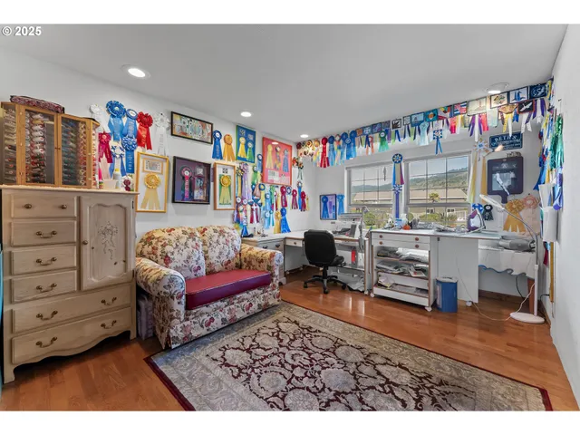 a bathroom with a double vanity sink mirror and toilet
