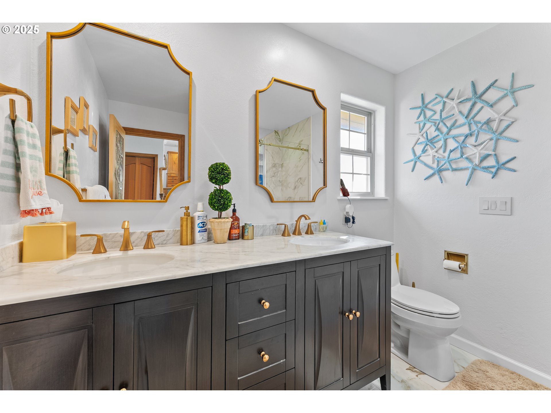 98686 Fox Drive Brookings, OR 97415 - Photo 35 of 48 a bathroom with a double vanity sink mirror and toilet