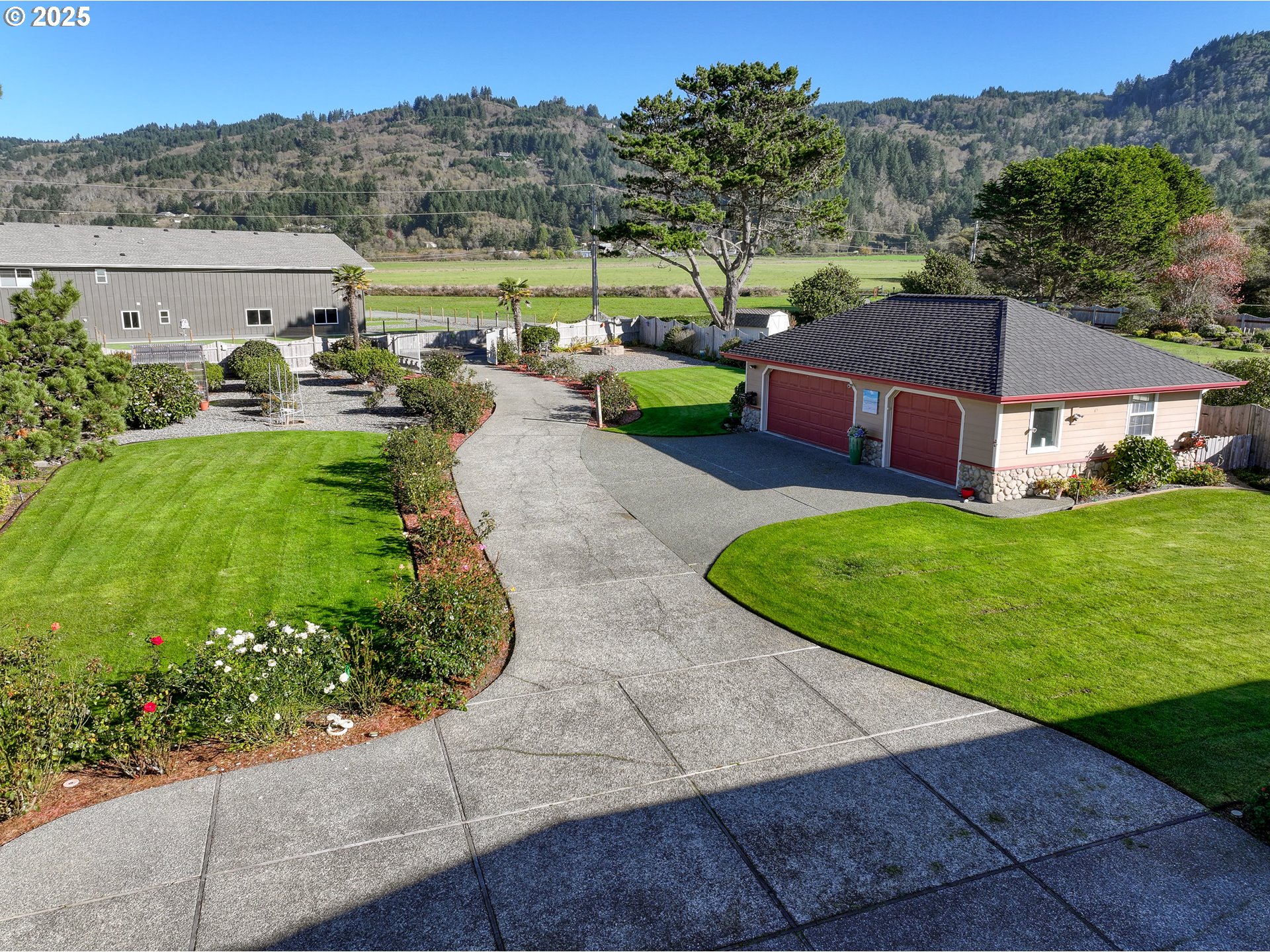 98686 Fox Drive Brookings, OR 97415 - Photo 43 of 48 an aerial view of a house with big yard