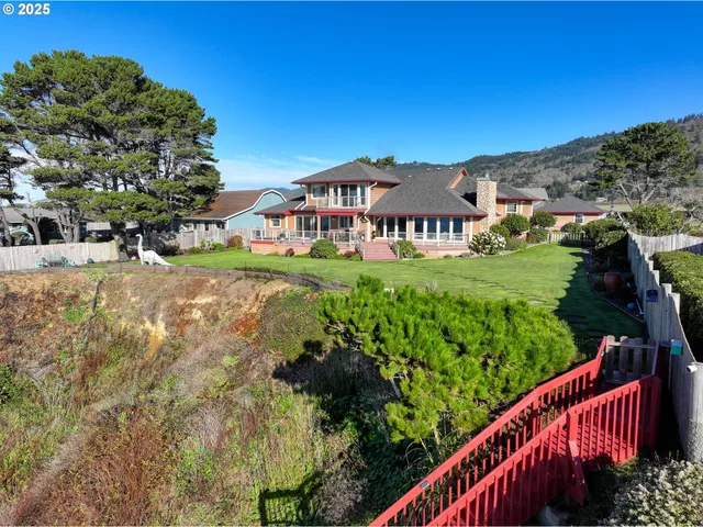 a view of a town with palm trees