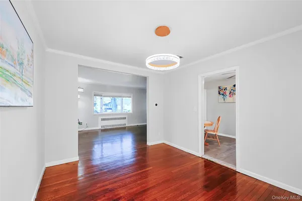 a view of livingroom with furniture and wooden floor